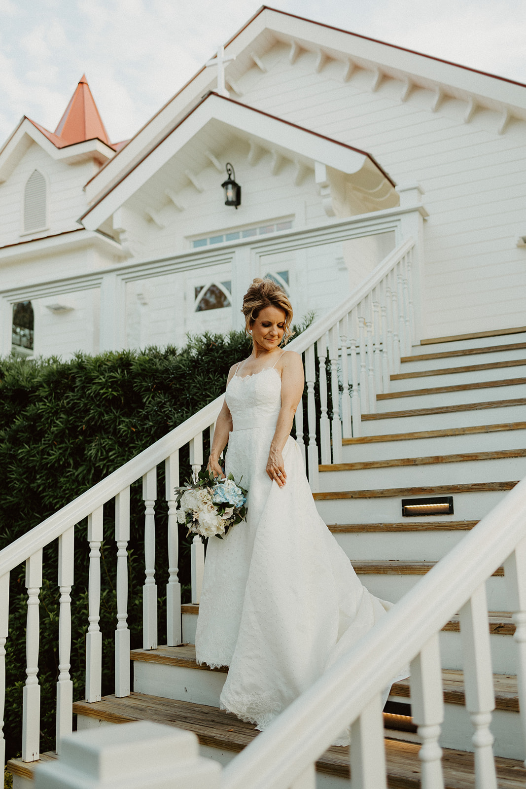 the bridal portraits on the chapel stairs during the Savannah Georgia Elopement