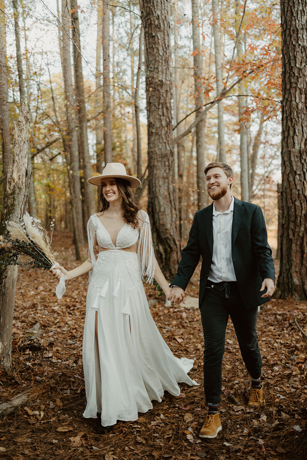 the couple walking in the woods at their elopement in Georgia