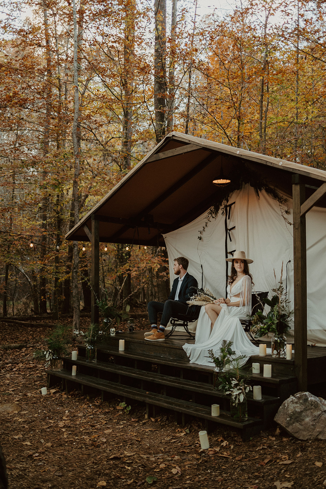 the couple sitting by the tent before their elopement in Georgia