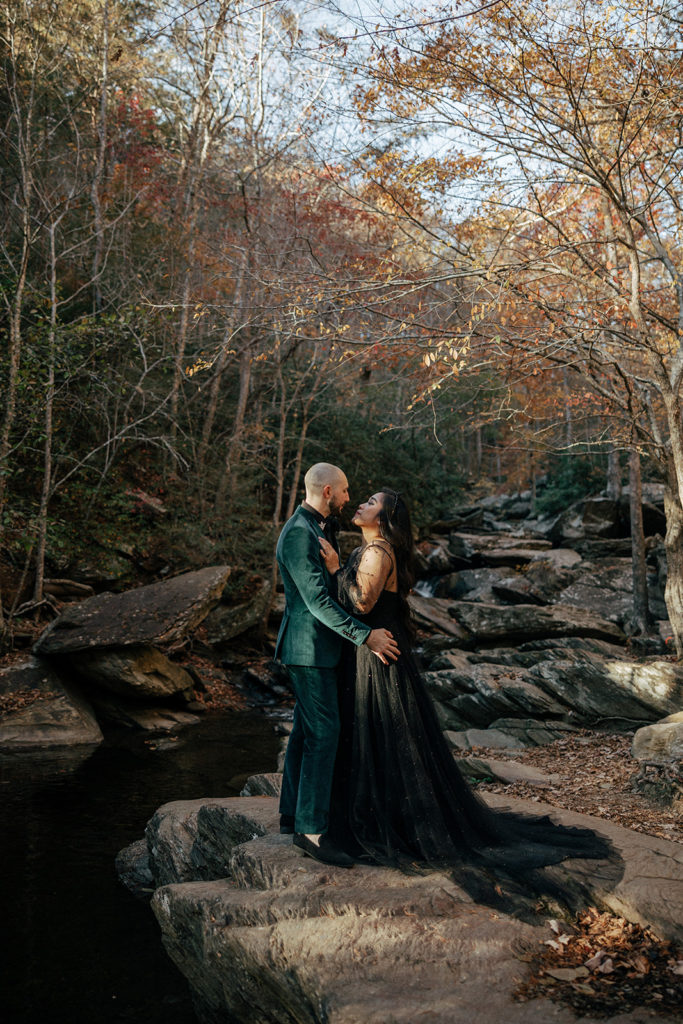 the bride and groom leaning in for a kiss during their elopement photos in Mineral Bluff