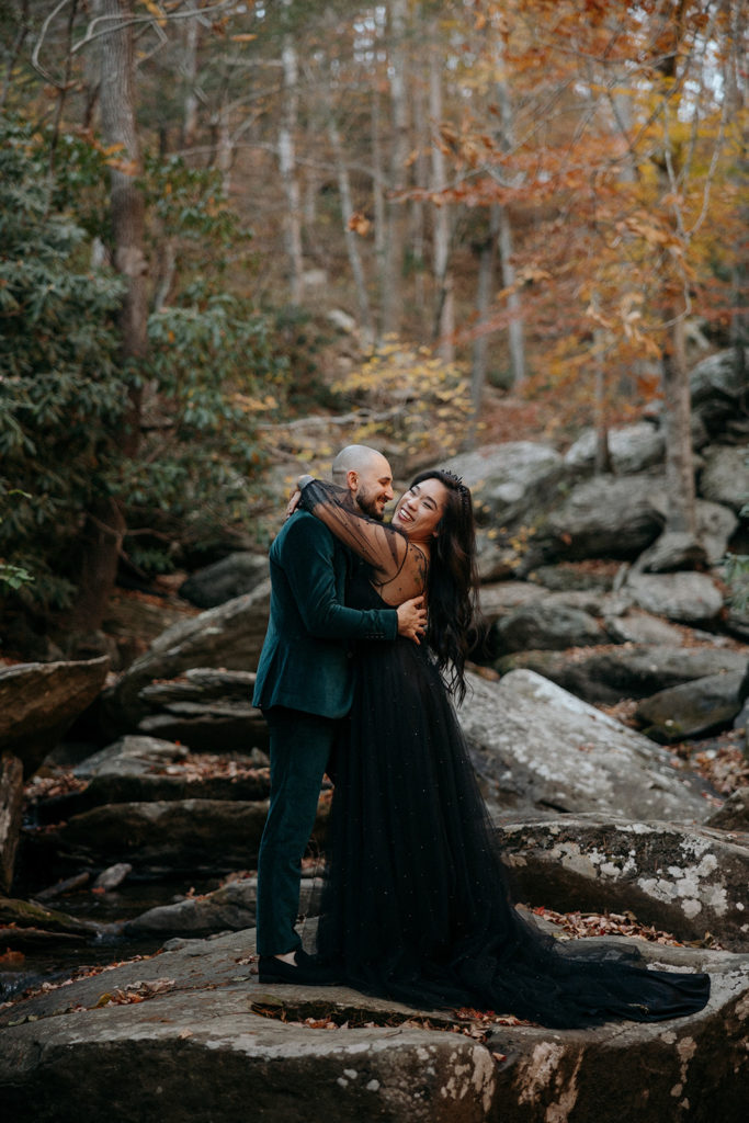 the bride and groom hugging in the mountains in Mineral Bluff